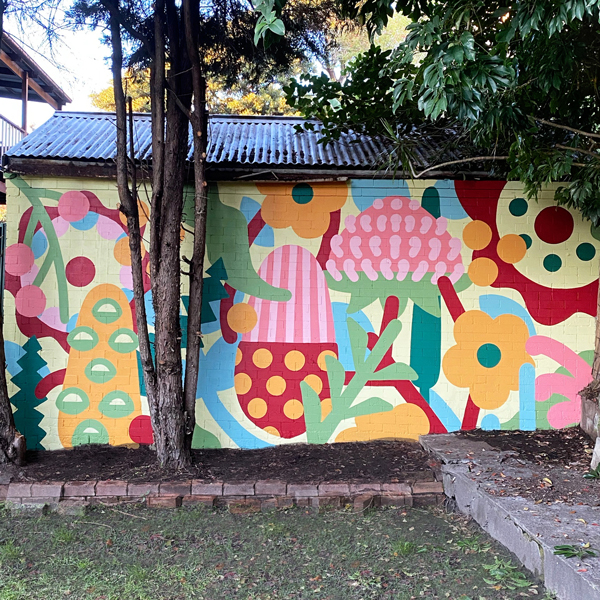 outdoor mural in Sydney painted by Sydney mural artist Nico Nicoson earlwood 2