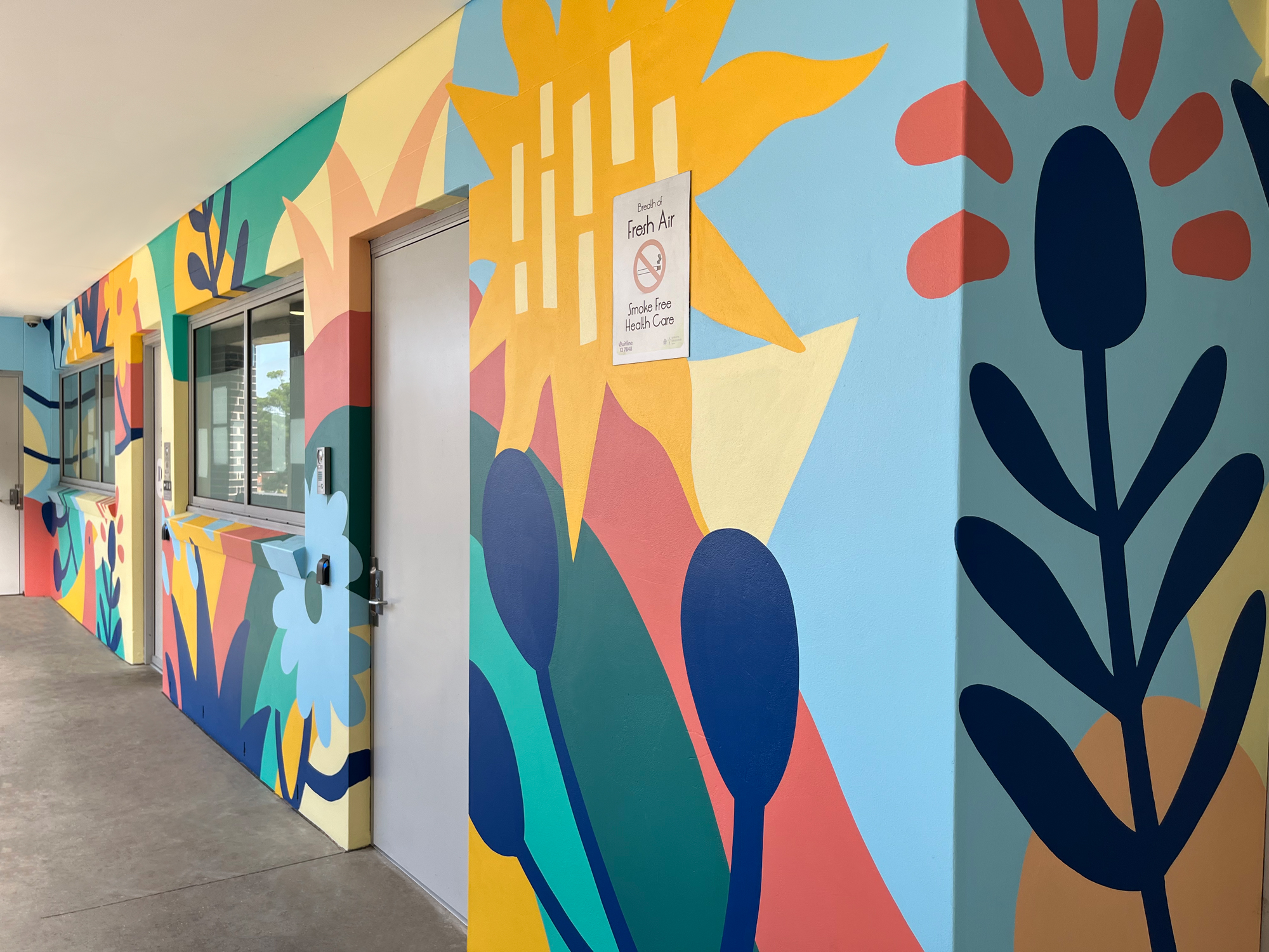 Outdoor mural in Sydney painted by mural artist Nico Nicoson.